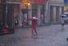 Lluvia en Pekin IV – NiÃ±a pequeÃ±a gran paraguas